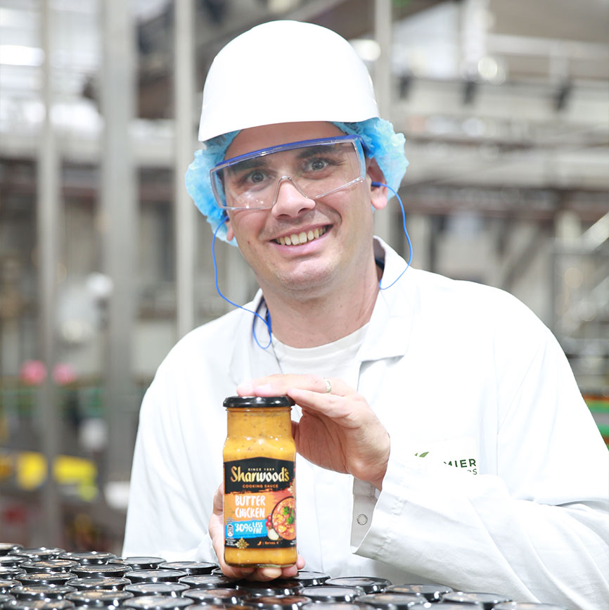 Sharwood's brand with man in factory