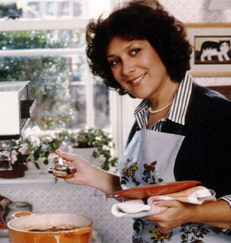 Lynda Bellingham cooking on a stove